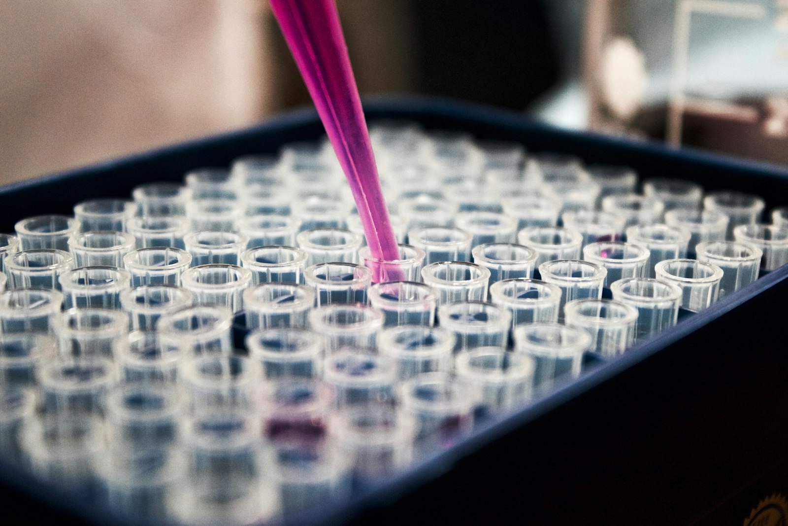 Pipetting samples into a microplate for chemical characterization testing
