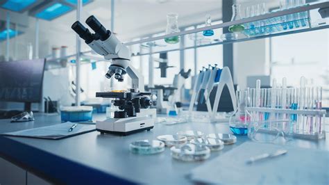 Medical laboratory equipment including a microscope and testing glassware
